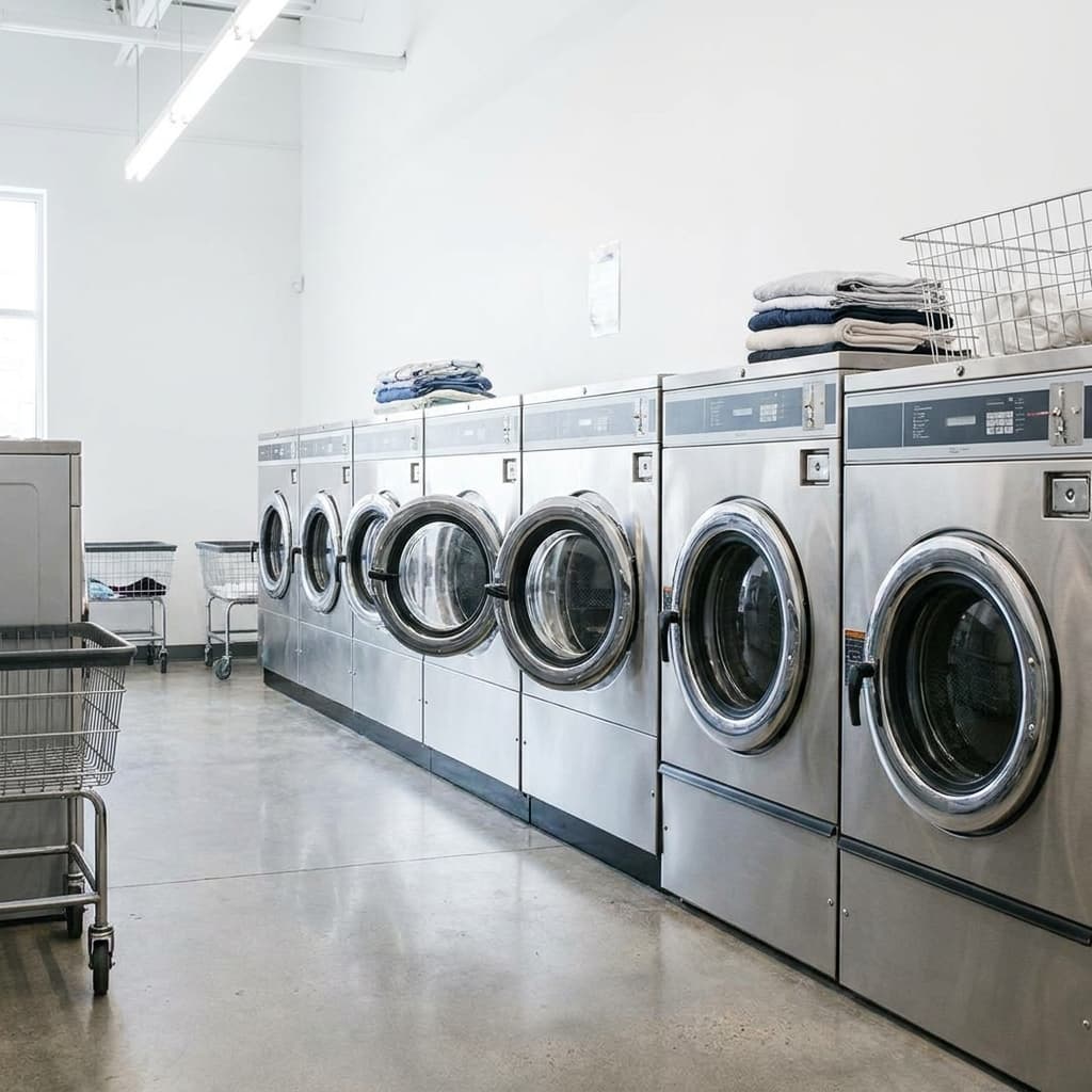 Row of front-load commercial washers